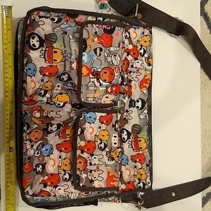 Lespoetsac tokidoki special edition crossbody with bottle holders. Authentic.